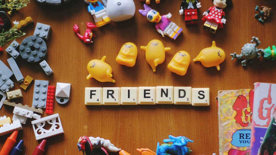 Photo of friends in letters.