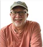 Contact me. An image of novelist Lewis Faulkner