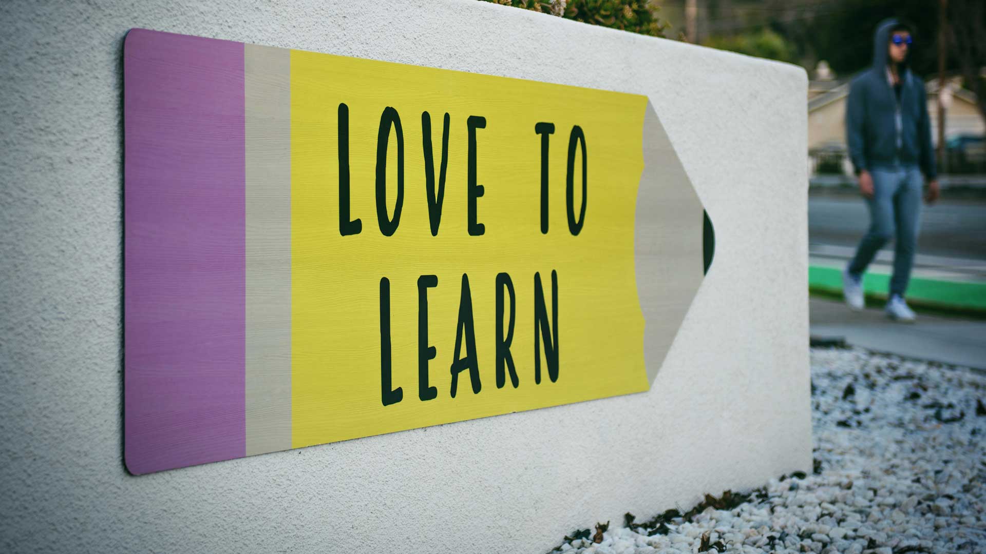 Photo of sign that reads "Love to Learn" for blog post “✍️ How to Write a Novel That Actually Works — Structure, Story, and Creative Process.” Photo by Tim Mossholder on Unsplash