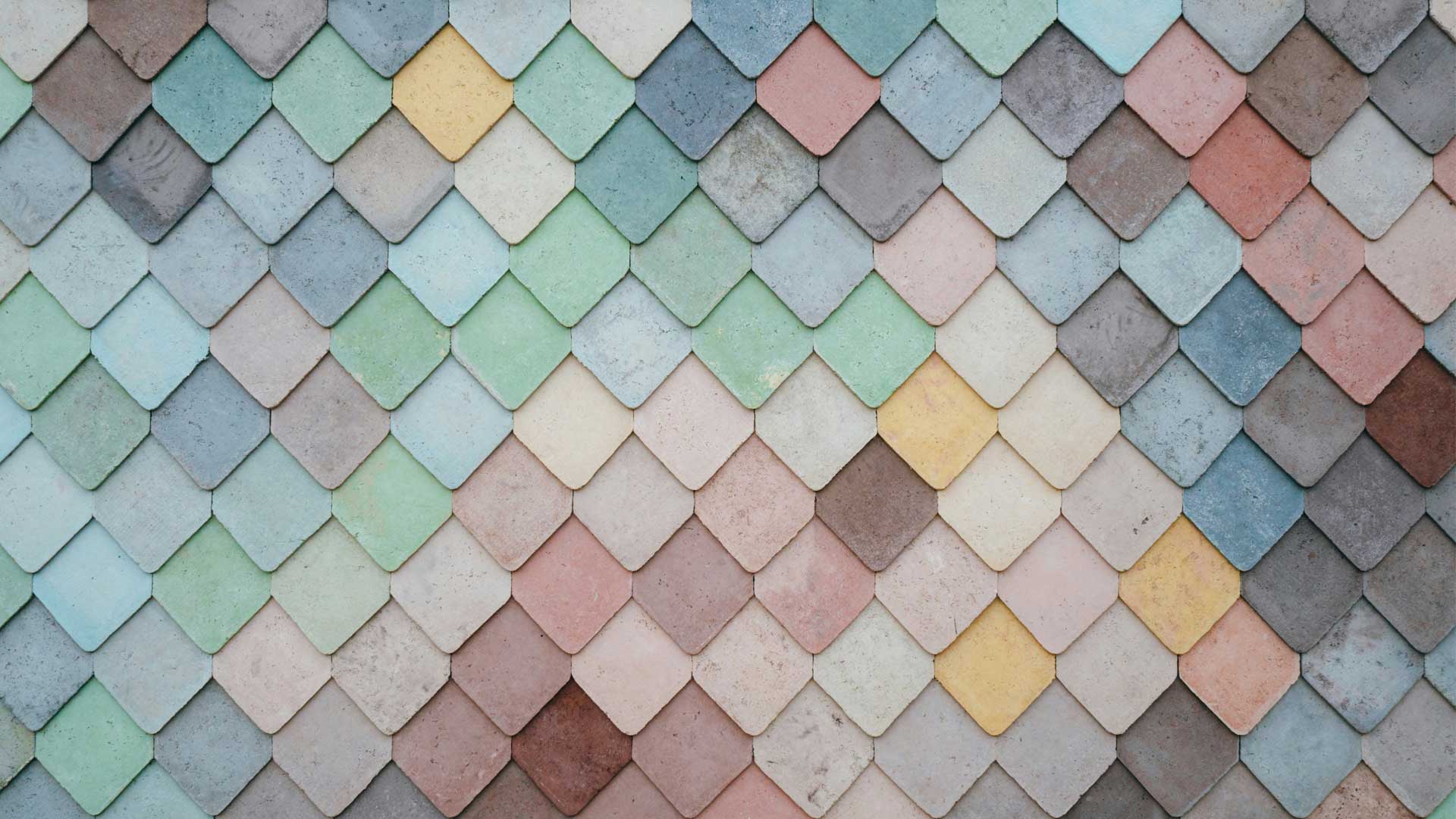 Photo of colorful tiles for a blog post "✍️ How to Write a Novel That Actually Works — Structure, Story, and Creative Process.” Photo by Andrew Ridley on Unsplash