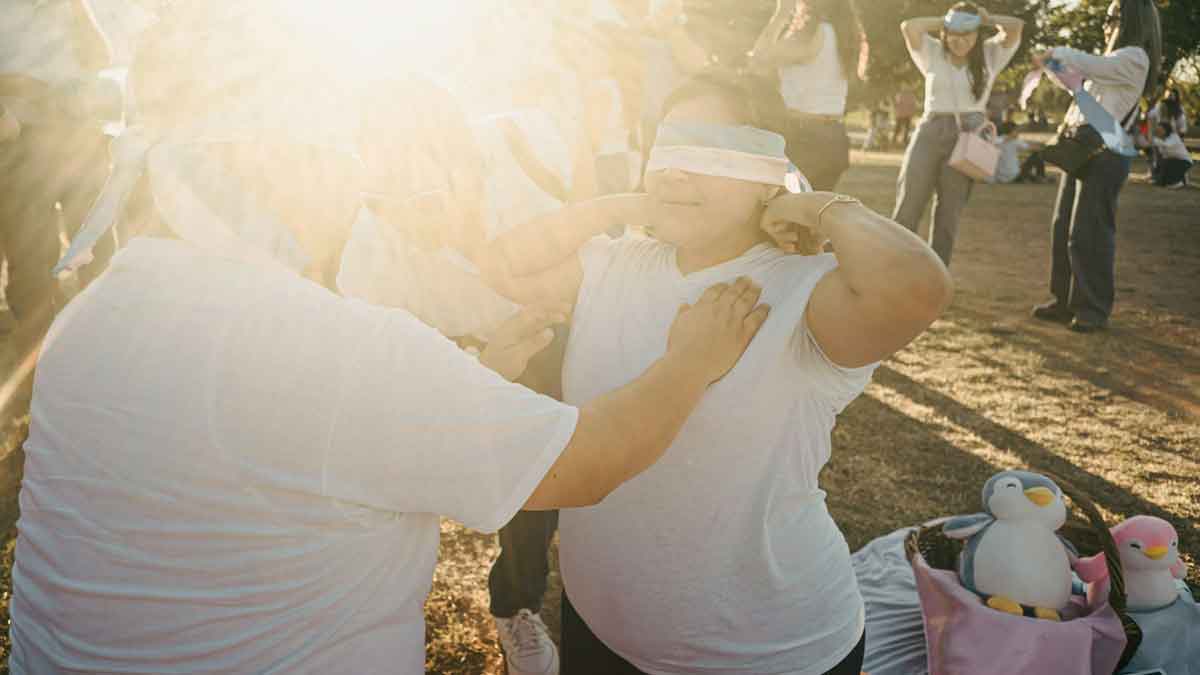 Blindfold01 Image of a woman being blindfolded.
